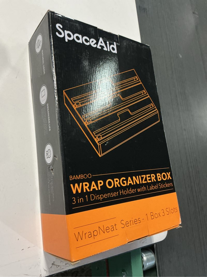 Condition photo showing New/Like New for SpaceAid WrapNeat 3 in 1 Wrap Organizer with Cutter and Labels, Plastic Wrap, Aluminum Foil and Wax Bamboo Dispenser for Kitchen Storage Organization Holder for 12" Roll (Natural) 3-Slot, 3"Tall 01 Natural