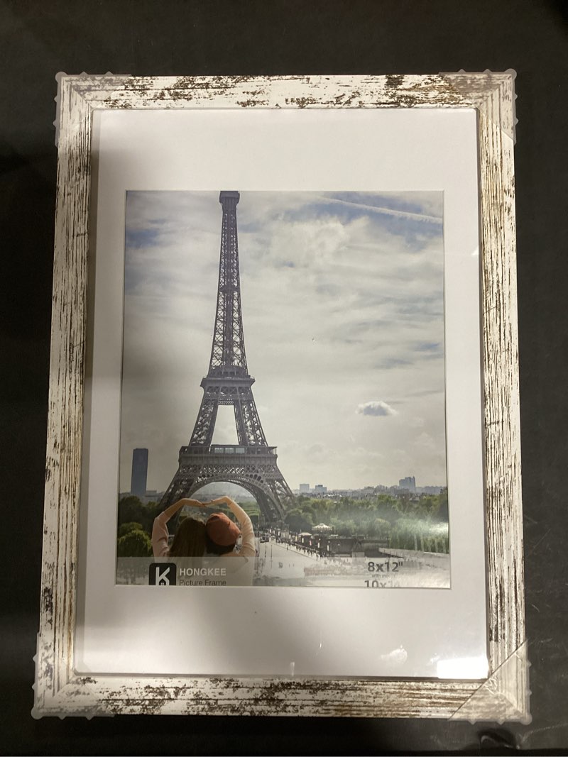 Condition photo showing New/Like New for 10x14 Picture Frame with Real Glass - 8x12 Wooden Frame with Mat, Horizontal and Vertical Display for Wall or Tabletop (Distressed White, 1 Pack) Distressed White 10X14 in