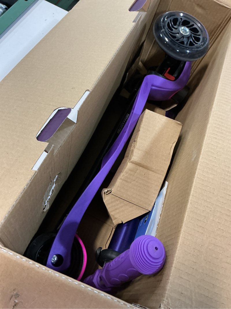 Condition photo showing Good Condition for micro kickboard | maxi led kids scooter for ages 5-12 | children up to 110 lbs | 3 wheel lean-to-steer design | adjustable t bar | smooth ride, motion activated pu led wheels | swiss design purple