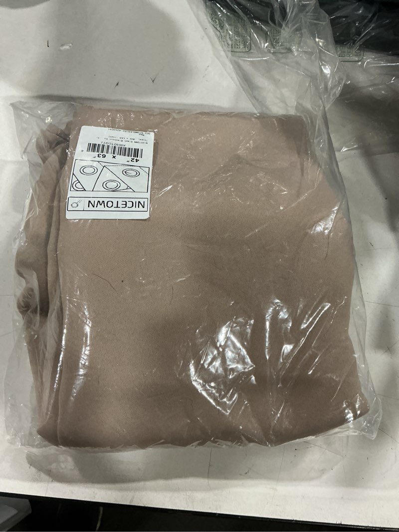 Condition photo showing Good Condition for nicetown sleek blackout curtains 63 inches length for small windows, noise reducing and block draft panels for door doorway laundry office luxury decor theme (2 panels, taupe, w42 x l63 -inch) taupe 42"w x 63"l (pack of 2)