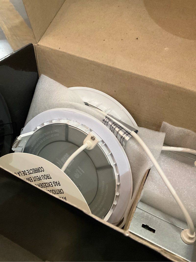 Condition photo showing As Is for juno contractor select wf6 matte white 6-in 950 -lumens switchable white round light