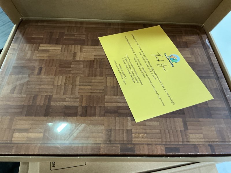 Condition photo showing New/Like New for cactus & cubby premium bamboo cutting board. deluxe deep carbonised end grain wooden cutting board. 16.5" x 11.8". pre-oiled butcher block for prepping & serving. knife friendly