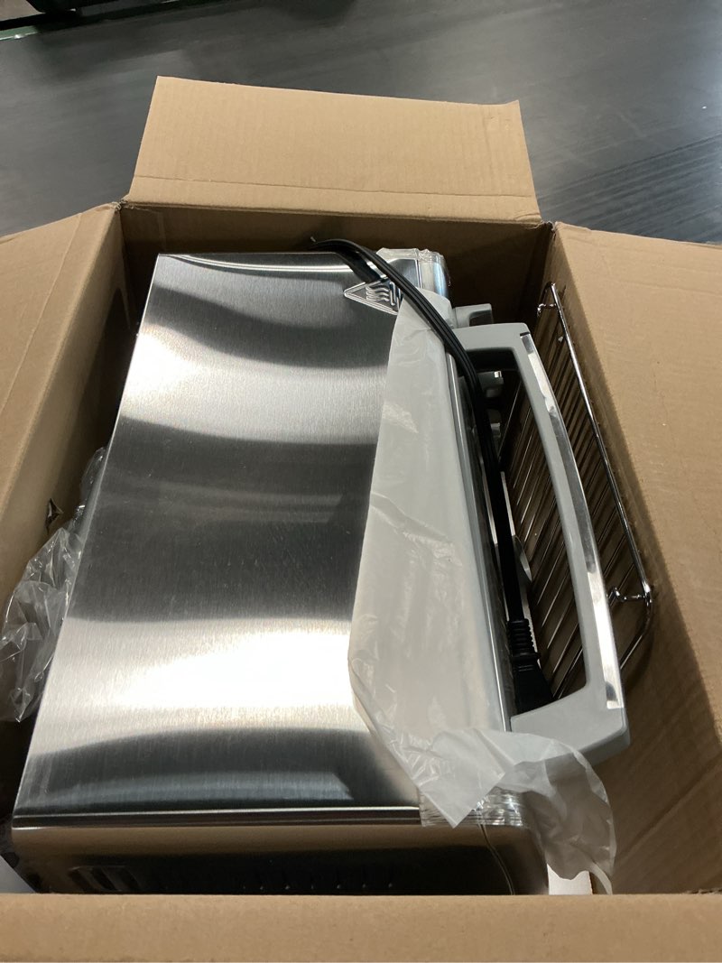 Condition photo showing As Is for black+decker 4-slice toaster oven with natural convection, stainless steel, to1760ss (to1760sst-1)