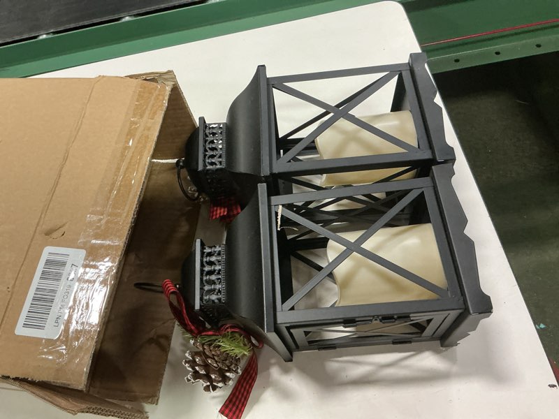 Condition photo showing Good Condition for Orchid & Ivy Set of 2 11-Inch Rustic Black Metal Lighted Holiday Lanterns with LED Candle, Timer, Greenery & Buffalo Plaid Ribbon – Hanging or Tabletop Christmas Decoration – Winter Home Decor