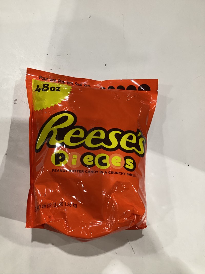 Condition photo showing New/Like New for reese's pieces candy (48-ounce pouches, pack of 12) 48 ounce (pack of 12) **best by:10/2025**