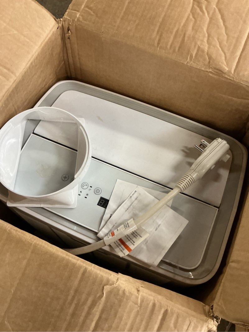Condition photo showing As Is for portable air conditioner
