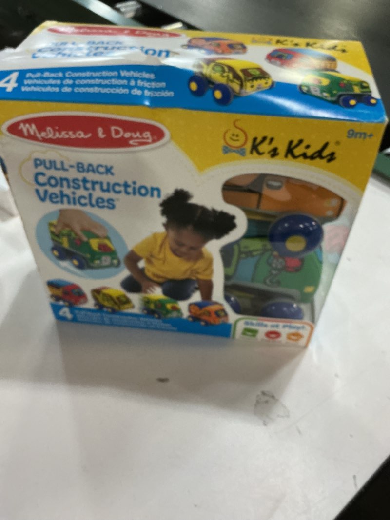 Condition photo showing New/Like New for Melissa & Doug Pull-Back Construction Vehicles - Soft Baby Toy Play Set of 4 Vehicles MAIN
