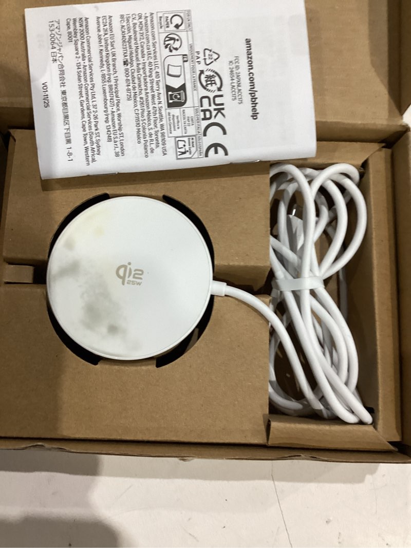 Condition photo showing As Is for amazon basics 25w qi2.2 certified wireless charging pad, magsafe compatible for iphone 17/16/15/14/13/12, magnetic compatible for android, google smartphones, white (adapter not included) 2.36x2.36x0.32 inches white