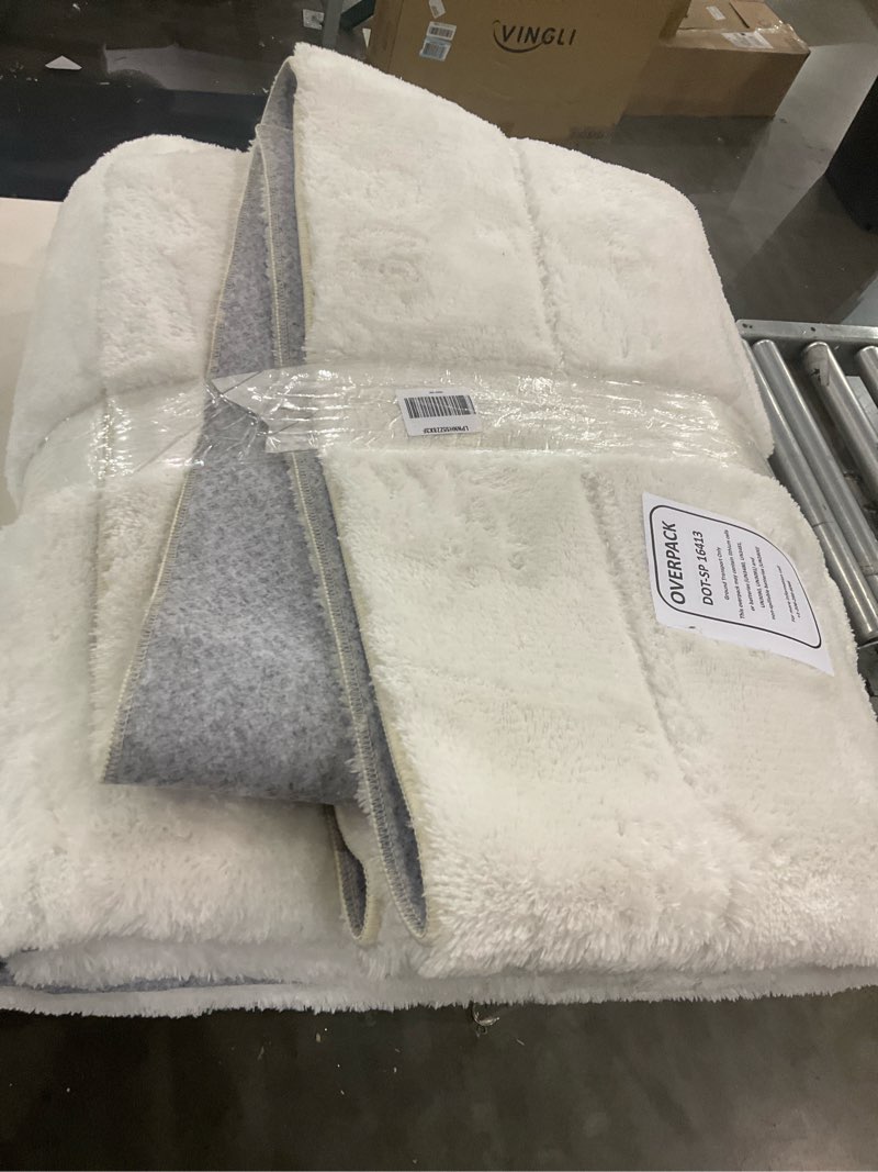Condition photo showing As Is for nuLOOM SuperiorWash Collection Kai Off-White, 5' x 8', Fluffy and Cozy, High Traffic, Stain Resistant, Easy Clean, Durable Washable Area Rug for Bedroom, Living Room, Dining, Den, Foyer, Entryway Kai Off White 5' x 8' (Rectangular)
