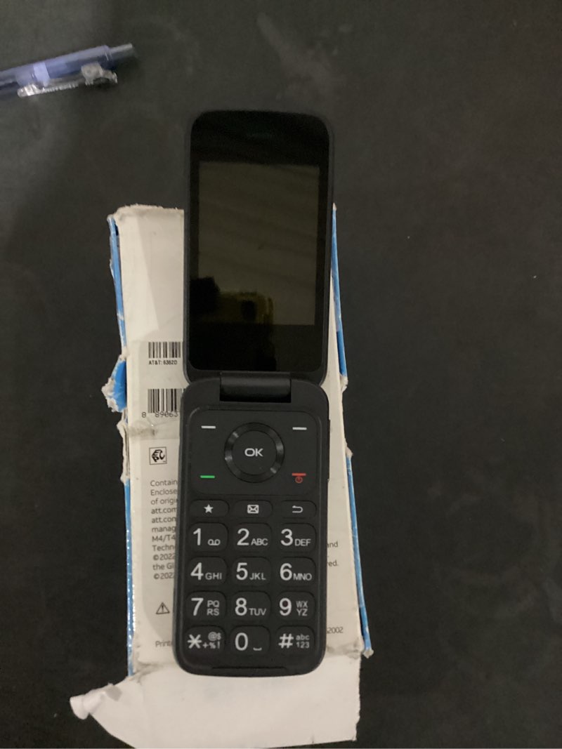 Condition photo showing As Is for doesnt power on tcl classic 4058w at&t 4g lte unlocked flip phone 8gb