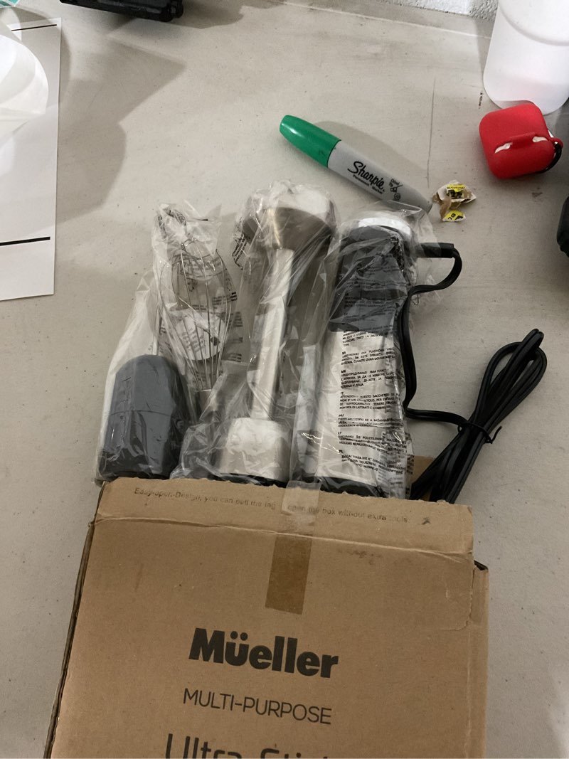 Condition photo showing New/Like New for muellerliving ultra-stick immersion hand blender, 500w heavy duty motor, 8-speed turbo setting, includes blending shaft, whisk, milk frother & measuring beaker