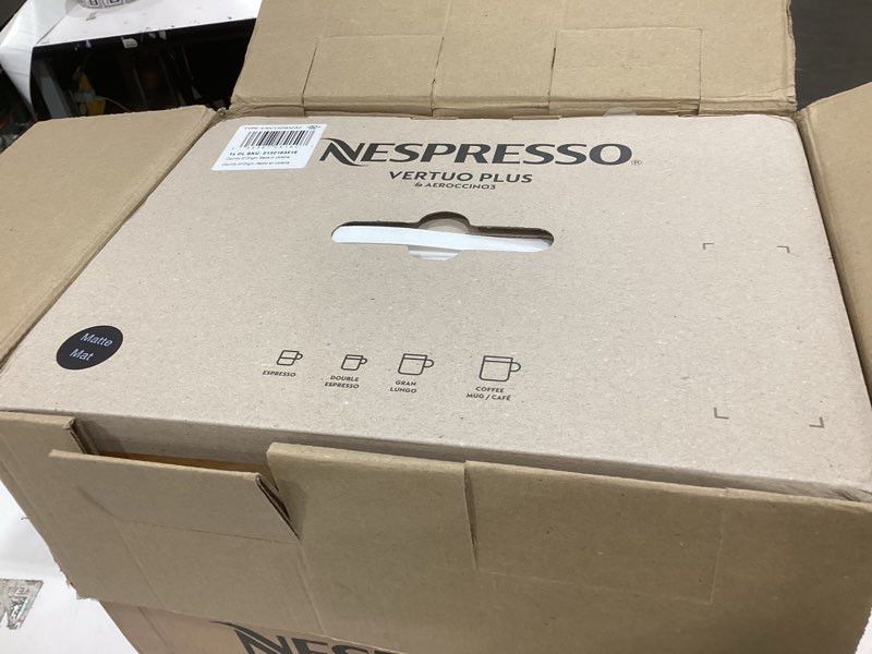 Condition photo showing New/Like New for nespresso vertuo plus deluxe coffee and espresso maker by de'longhi, matte black with aeroccino milk frother machine + frother matte black