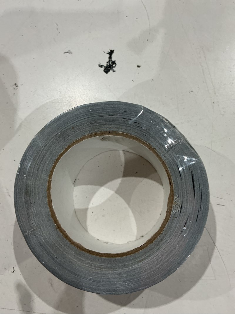 Condition photo showing As Is for silver heavy duty duct tape 2 inch x 30 yard – strong adhesive, waterproof, easy tear, no residue, ideal for sealing, patching & repairs indoors or outdoors