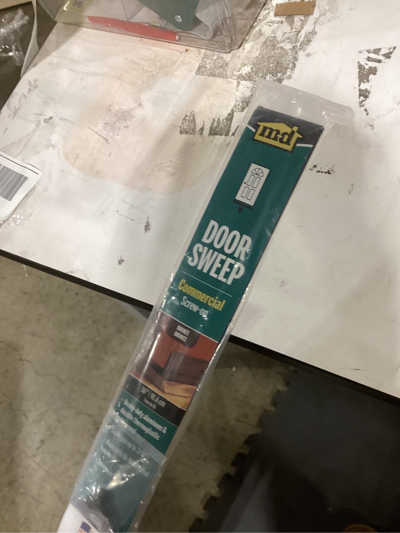 Condition photo showing New/Like New for M-D Building Products 68254 All-Season Door Sweep, Heavy Duty Aluminum, Ideal for Residential & Commercial Use, Easy Installation with Heavy Rubber Seal, Ensure Comfort and Security (36 Inch, Bronze) Bronze 36 Inch