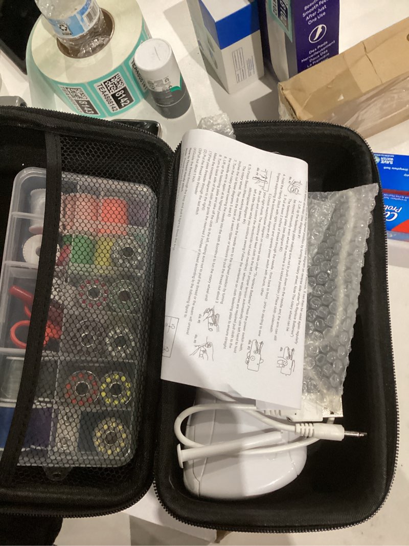 Condition photo showing As Is for handheld sewing machine with black storage case and 109-piece sewing kit, mini portable cordless hand sewing machine, ideal for adults & beginners, complete set of quick home clothing repair tools white