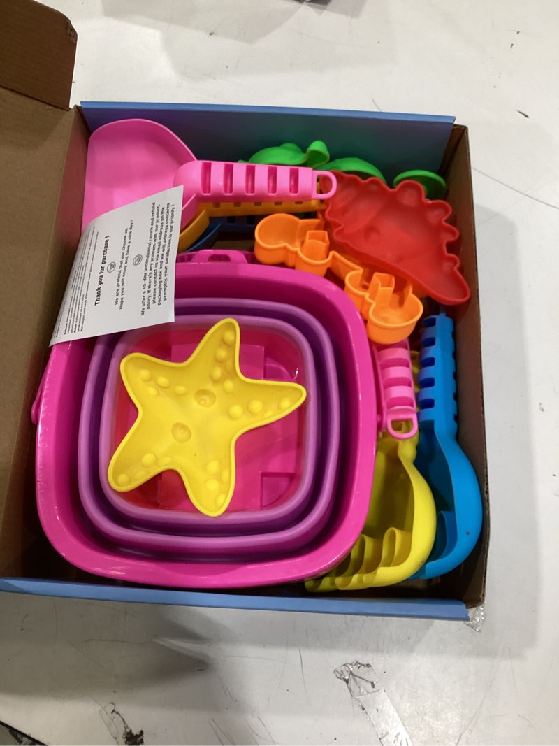 Condition photo showing Good Condition for dreamon beach toys for kids 3-10, collapsible sand castle toys for beach include 3 pack foldable buckets, shovels molds and storage mesh bag, sandbox travel toy for toddlers kids 3 bucket set