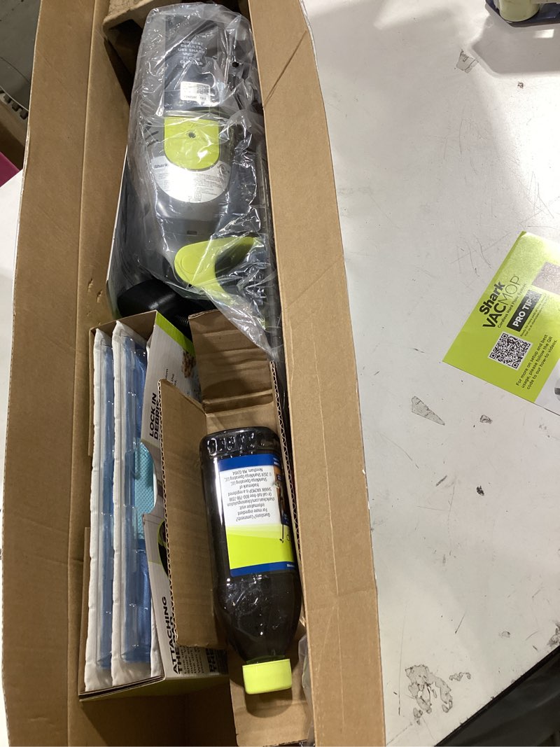 Condition photo showing New/Like New for shark vacmop cordless hard floor cleaner, vacuum and spray mop, powerful suction, lightweight, led headlights, includes 4 disposable pads, 12oz multi-surface cleaning solution, gray, vm252 gray - 4 pads