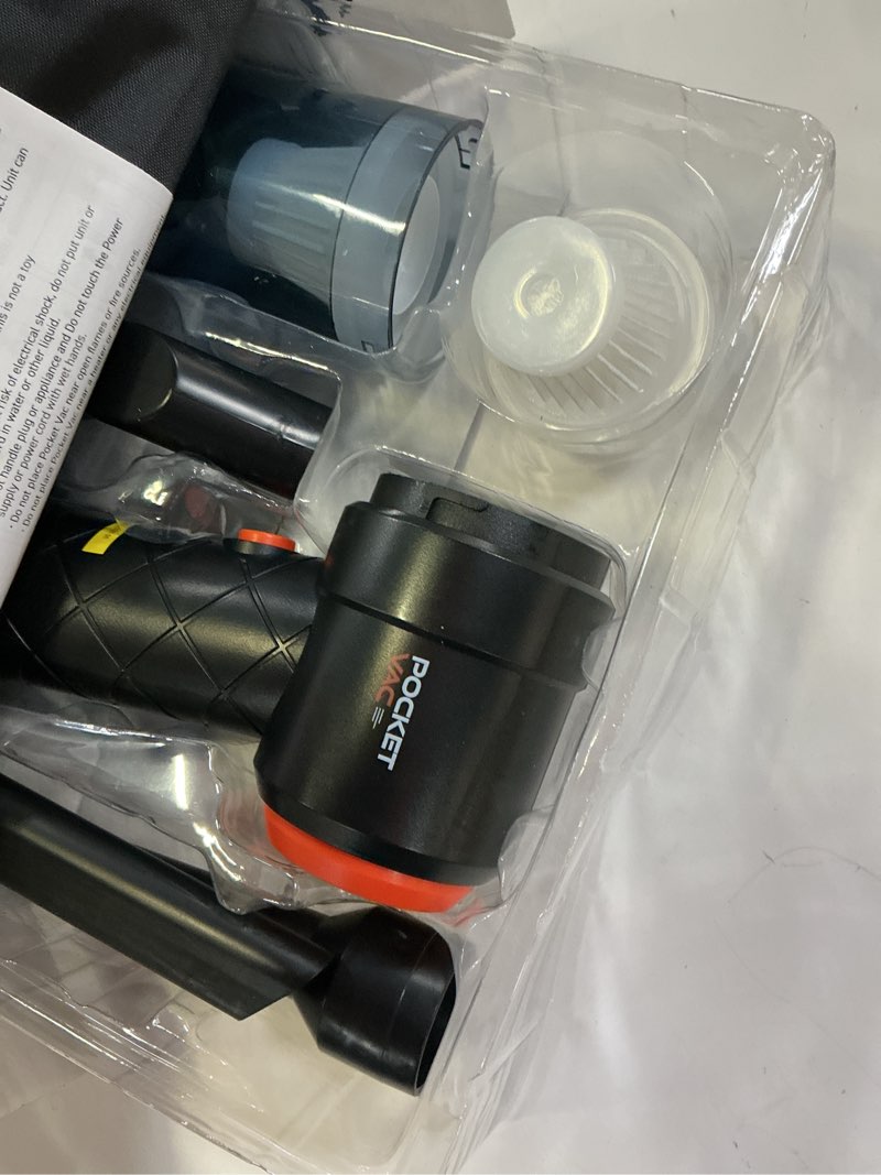 Condition photo showing As Is for pocket vac rechargeable handheld vacuum with accessories - new - cordless - portable - as seen on tv