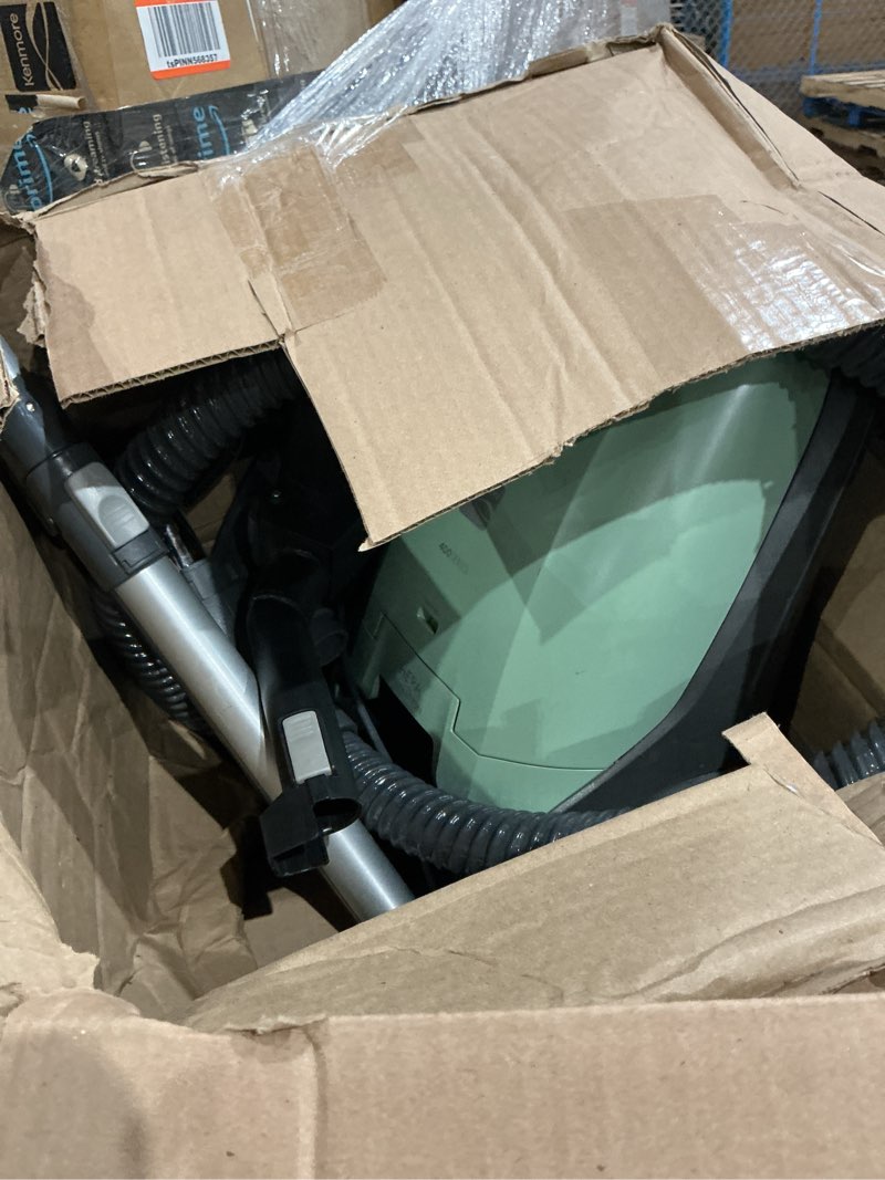 Condition photo showing As Is for kenmore bc2005 pet friendly lightweight bagged canister vacuum cleaner with extended telescoping wand, hepa filter, retractable cord, and 2 cleaning tools green