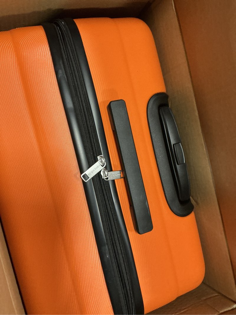 Condition photo showing Good Condition for Amazon Basics 30" Hardside Large Checked Luggage, Hardshell Suitcase With Wheels, Expandable For Up to 15% More Space, With Scratch-Resistant Surface, Four Multi-directional Wheels, Orange Orange Large Checked