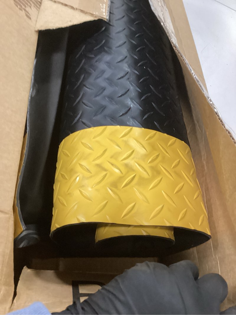 Condition photo showing As Is for Timgle Anti Fatigue Mats Industrial 2' x 3' Heavy Duty Commercial Grade Diamond Plate Vinyl Non Slip Safety Ergonomic Standing Floor Mat Black with Yellow Border 7/8 Inch Thick Sponge for Work Stand 23.6" X 35.4"