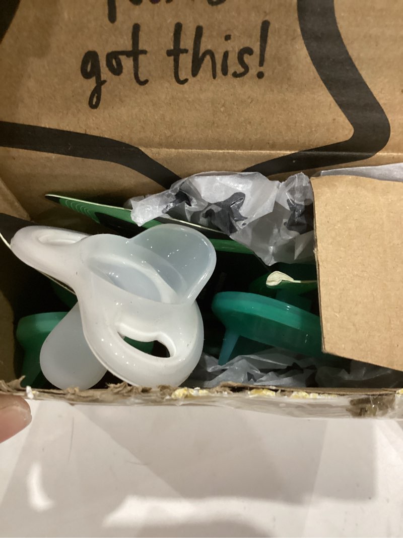 Condition photo showing As Is for Tommee Tippee Ultra-Light Silicone Pacifier, 0-6 Months, Symmetrical One-Piece Design, BPA-Free Silicone Binkies, Blue/Green/Clear, Pack of 4 0-6 Month (Pack of 4)