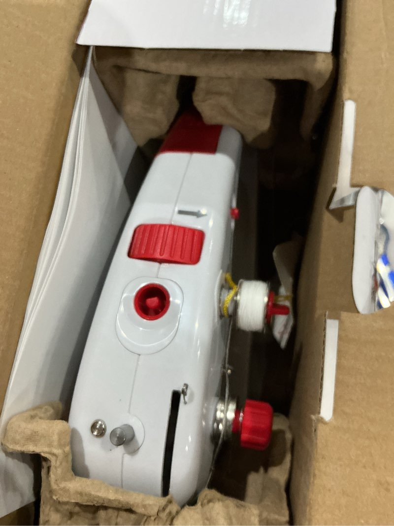 Condition photo showing As Is for singer stitch quick plus cordless handheld portable mending machine for sewing repairs, two thread