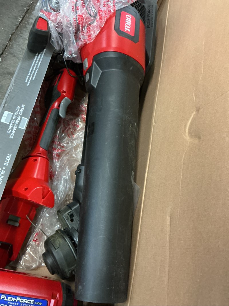 Condition photo showing As Is for toro flex-force 60-volt max cordless battery string trimmer and leaf blower combo kit 2 ah (battery & charger included)
