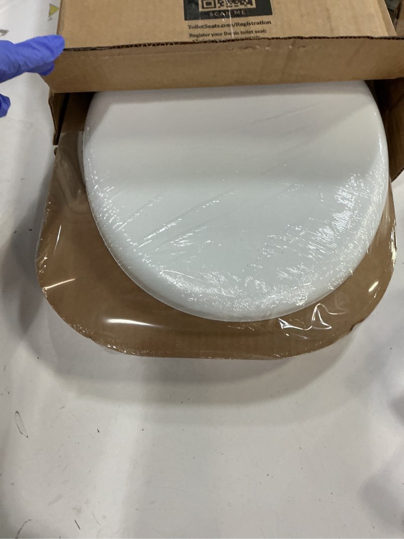 Condition photo showing New/Like New for Mayfair Padded Toilet Seat, Cushioned Soft Vinyl over Wood Core Seat, Secure Hinges, Easy Clean, Made in USA, Round, White Round White Toilet Seat