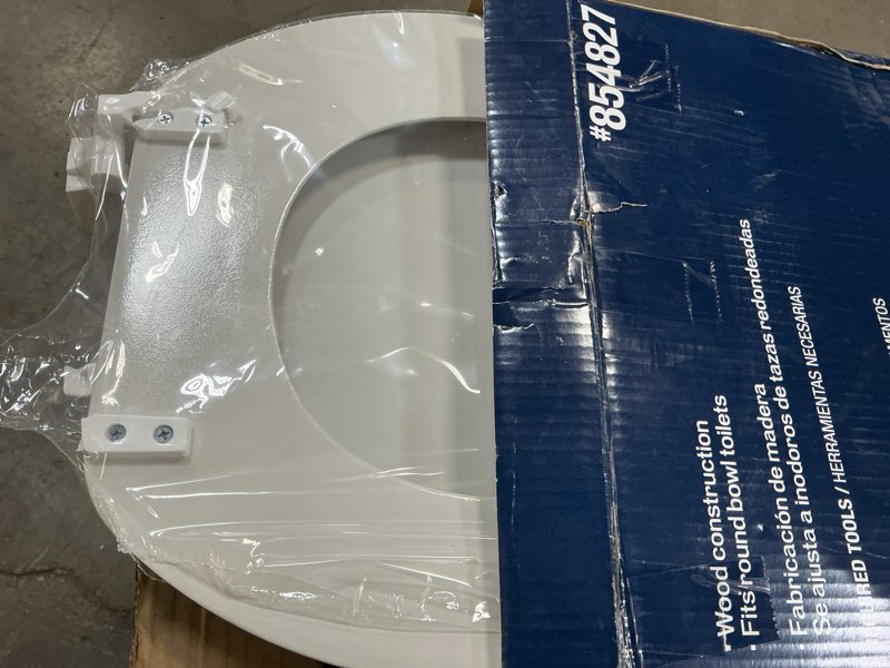 Condition photo showing As Is for project source 854827 round toilet seat white wood