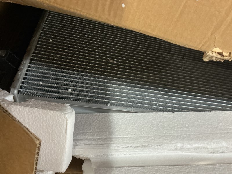 Condition photo showing As Is for Radiator for car infiniti QX56