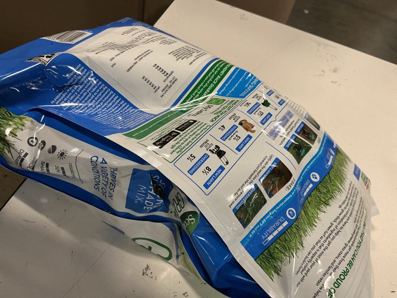 Condition photo showing item condition for Scotts Turf Builder Grass Seed Sun & Shade Mix with Fertilizer and Soil Improver, Thrives in Many Conditions, 5.6 lbs. 5.6 lb.