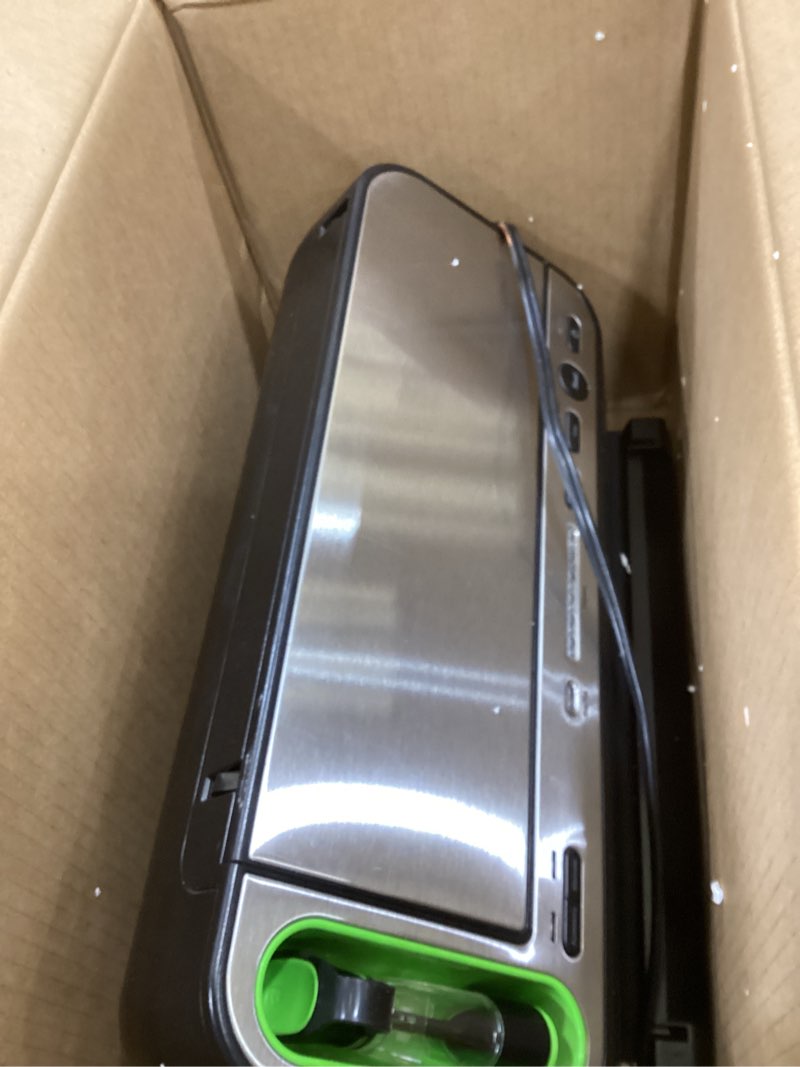 Condition photo showing As Is for FoodSaver V4400 2-in-1 Vacuum Sealer Machine with Automatic Vacuum Sealer Bag Detection and Starter Kit Machine & Starter Kit