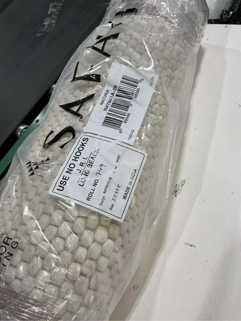 Condition photo showing Good Condition for SAFAVIEH Natura Collection Area Rug - 8' x 10', Ivory, Handmade Wool, Ideal for High Traffic Areas in Living Room, Bedroom (NAT620A)