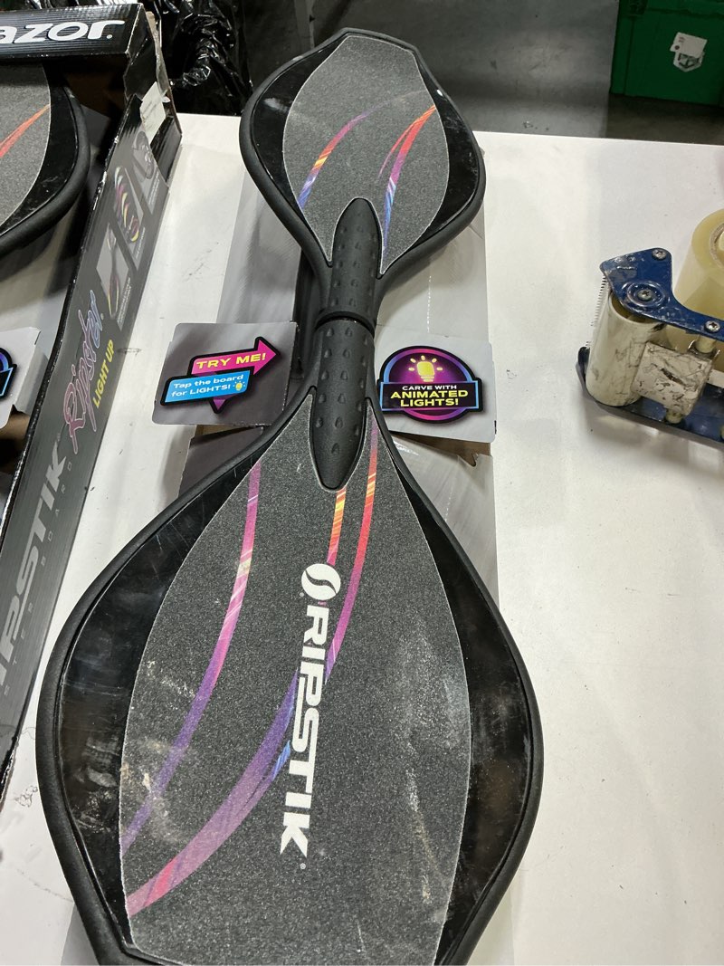 Condition photo showing As Is for razor black label ripstik ripster light up–two wheel caster board with multi-color led lights, compact and lightweight, for kids and teens