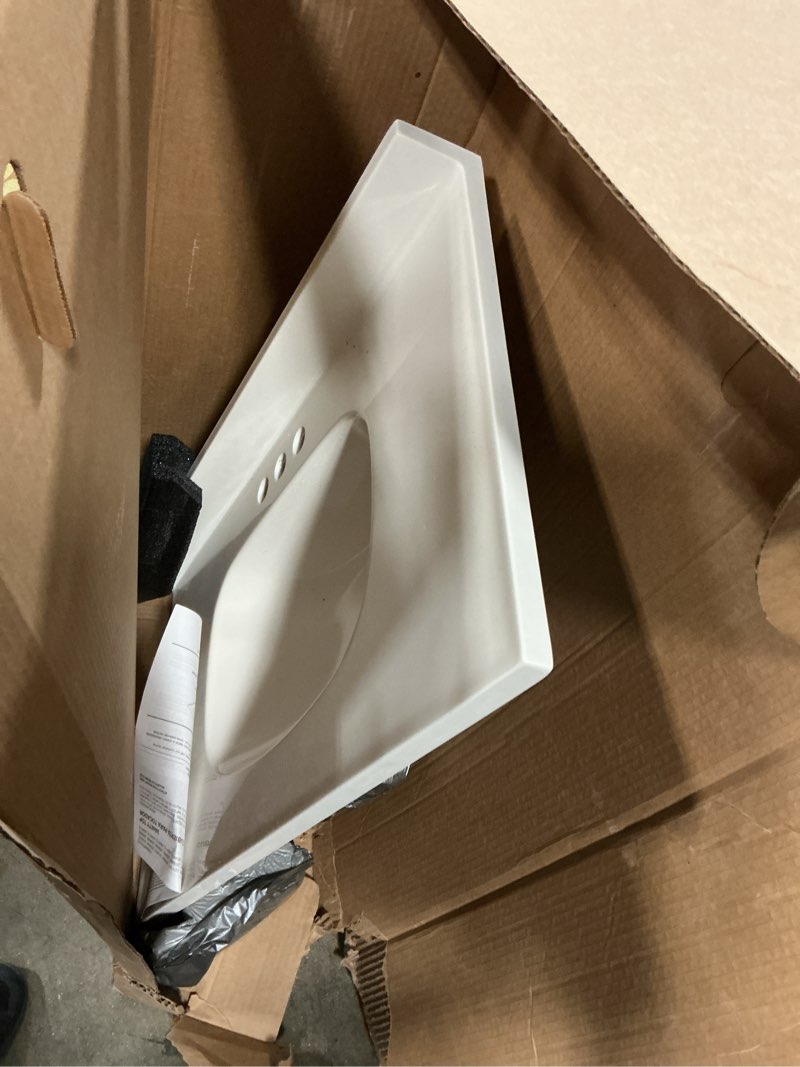 Condition photo showing item condition for Project Source 37-in x 22-in White Cultured Marble Single Sink 4-in Centerset Faucet