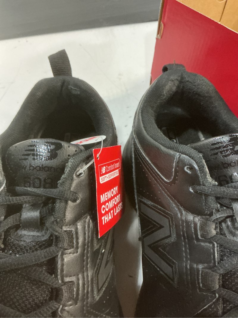 Condition photo showing As Is for new balance women's 608 v5 casual comfort cross trainer 9.5 wide black/black