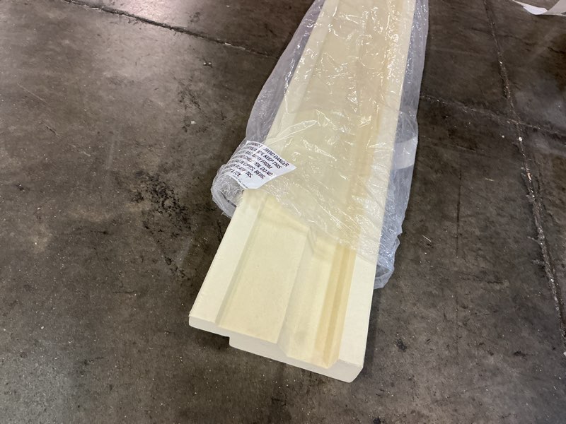 Condition photo showing As Is for beige colored baseboard trim