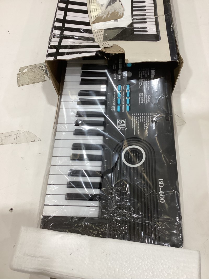 Condition photo showing Good Condition for 61 key keyboard Piano,Portable Electronic Digital Piano,Built In Dual Speakers,External Microphone,Power Plug,Rich Teaching Content,Multi-Functional Electronic Piano Suitable For Beginners kkek5 black