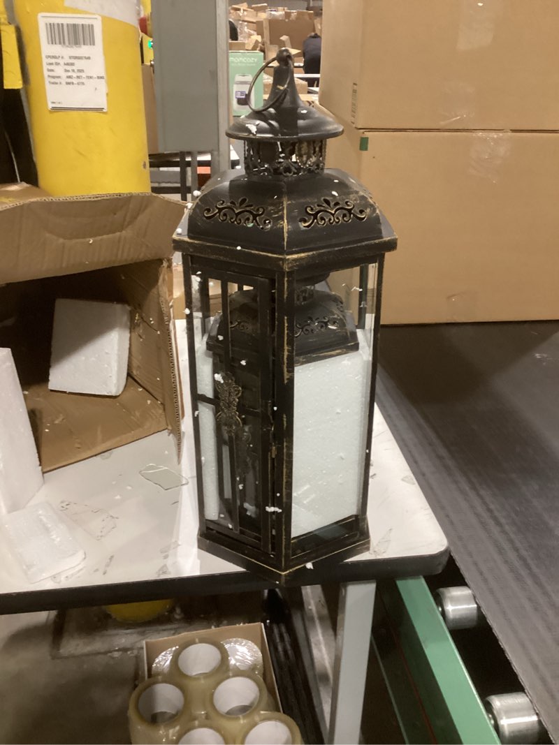 Condition photo showing As Is for JHY DESIGN Set of 3 Decorative Candle Lanterns 20''&14"&10" H Outdoor Candle Lanterns Vintage Metal Cand leholder for Indoor Outdoor, Events, Parities and Weddings(Black with Gold Brush) 20''&14"&10"h Black