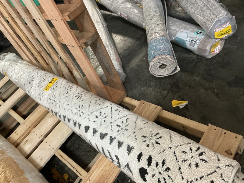 Condition photo showing As Is for style selections lost stone 8-10 ft loomed polyester white rectangular indoor tribal