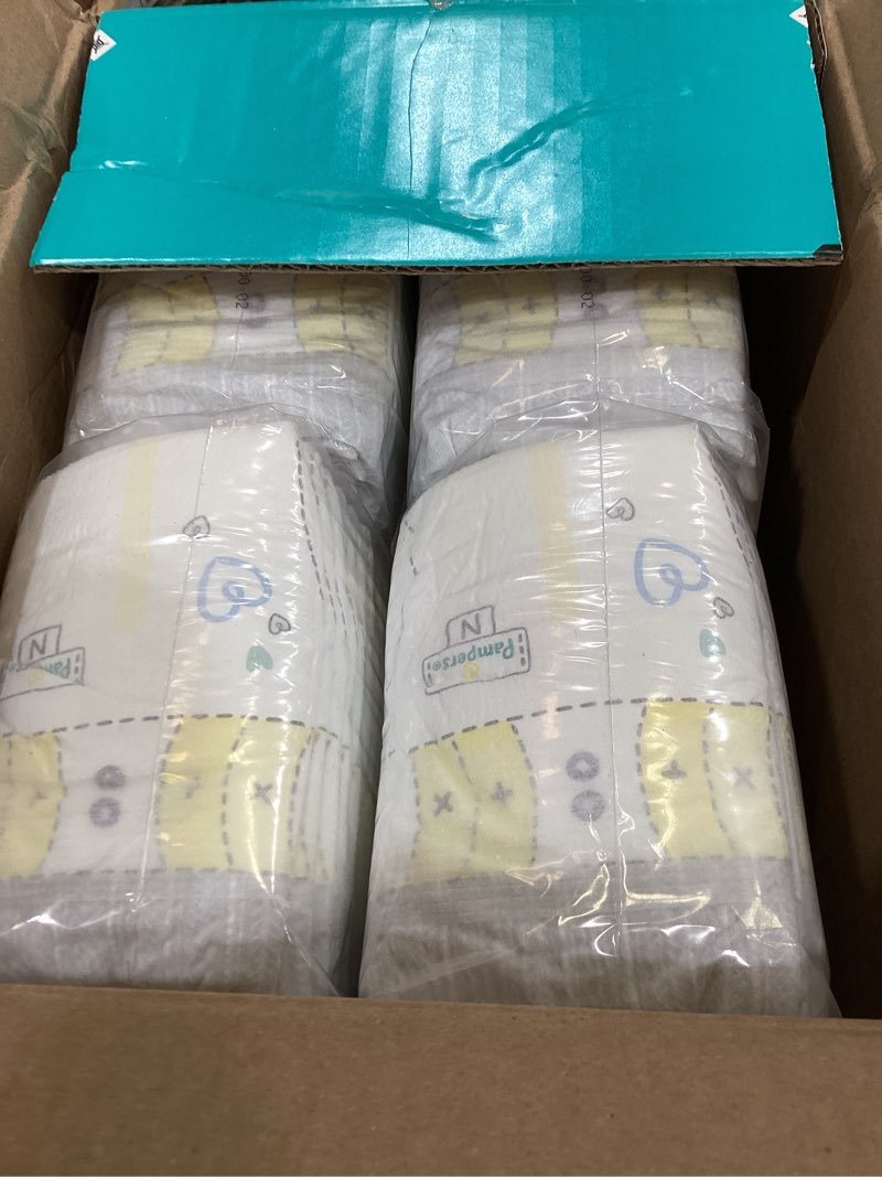 Condition photo showing As Is for pampers swaddlers newborn diapers, size newborn (10 lbs), 84 count, fragrance free, hypoallergenic, absorbent, pediatrician recommended, skin safe newborn 84