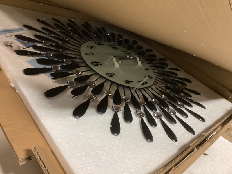 Condition photo showing Good Condition for 24 INCH Large Wall Clock for Living Room Decor,Non-Ticking Quiet Metal Petals Dial Glass Big Wall Clocks Black for Bedroom,bedrooms Kitchen and Small Space Decoration Black 24.0 Inch