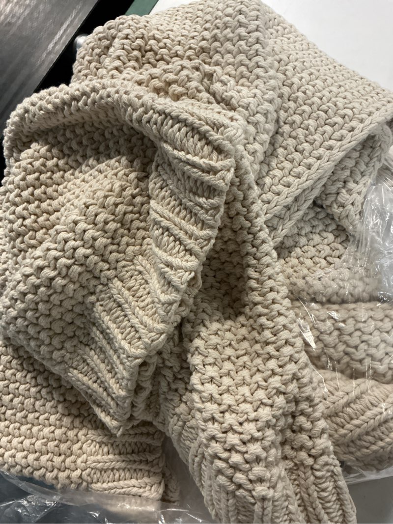 Condition photo showing New/Like New for quince organic cotton beige throw blanket