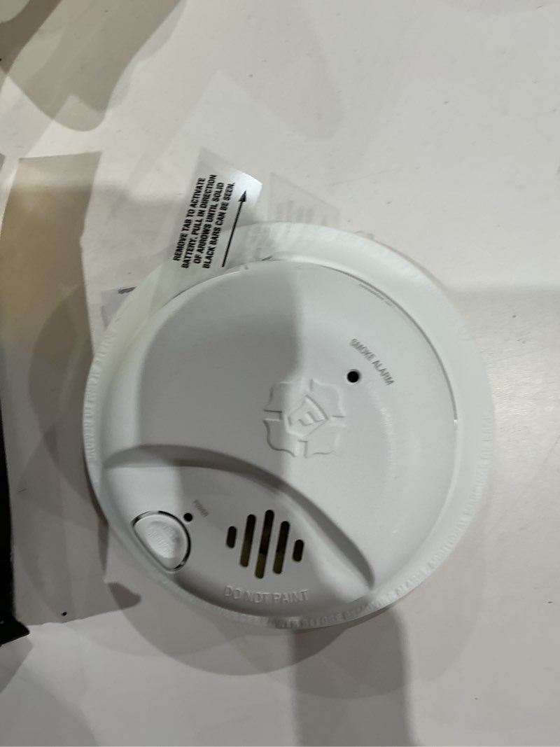 Condition photo showing As Is for missing pieces. first alert brk 10-year battery hardwired (with battery back-up) ionization interconnected smoke detector