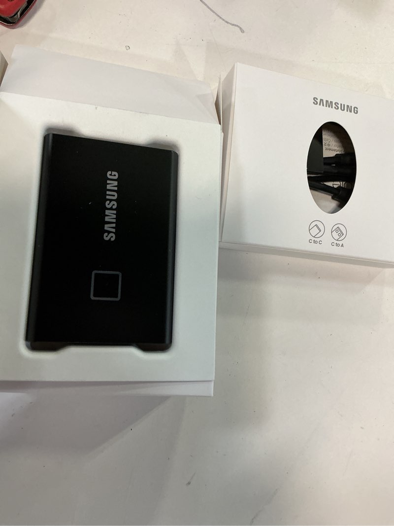 Condition photo showing New/Like New for Samsung T7 Touch Portable SSD 2TB,up to 1050MB/s, USB 3.2 External Solid State Drive, Black (MU-PC2T0K/WW)