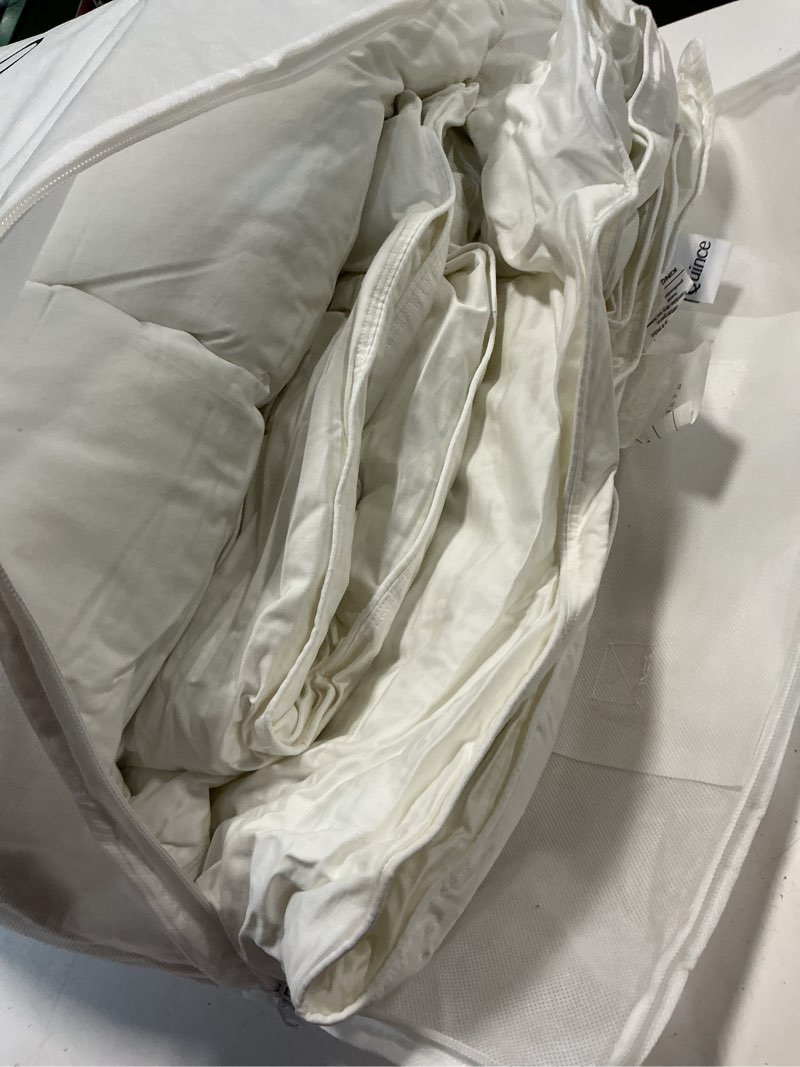 Condition photo showing As Is for all-season premium down alternative comforter, king/cal king, white