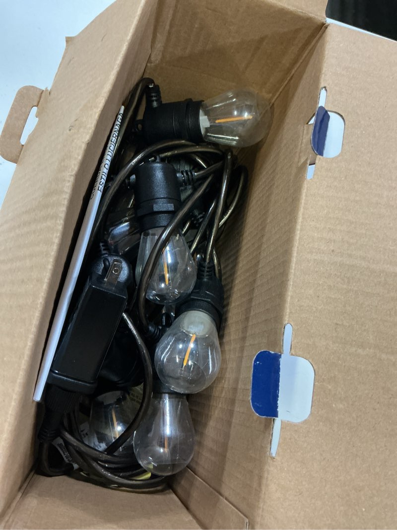 Condition photo showing As Is for harbor breeze 24-ft plug-in black outdoor string light with 12 led edison bulbs