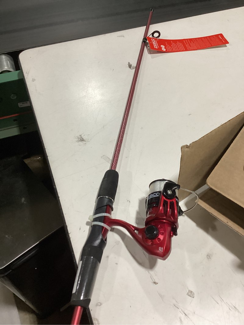 Condition photo showing Good Condition for zebco slingshot spinning reel and fishing rod combo, 2-piece medium-light durable fiberglass rod, comfortable eva handle, pre-spooled with 8-pound cajun fishing line 5'6" rod - red