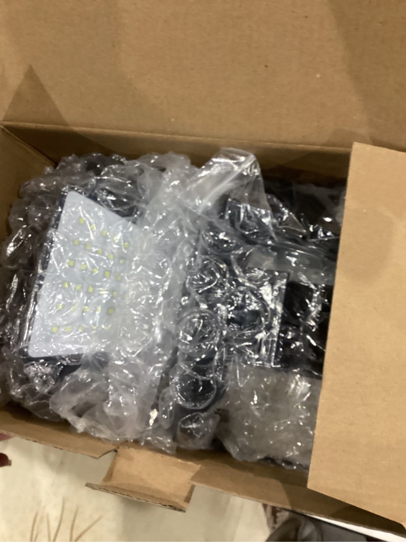Condition photo showing Good Condition for solar outdoor lights - 3000lm 188 led motion sensor outdoor lights, 4 heads security light,ip65 waterproof, easy install,270°wide angle flood wall light with 3 modes for backyard yard (2 pack)
